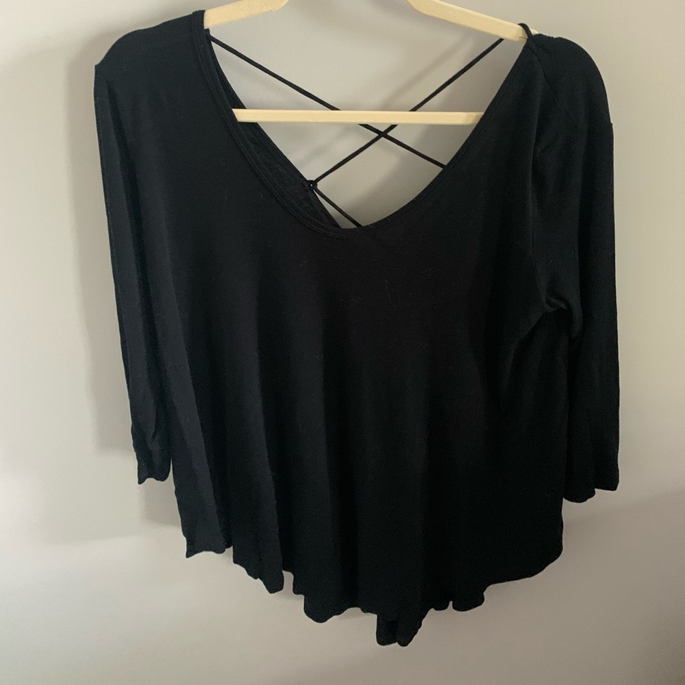 Women’s black top with criss cross tie in the back